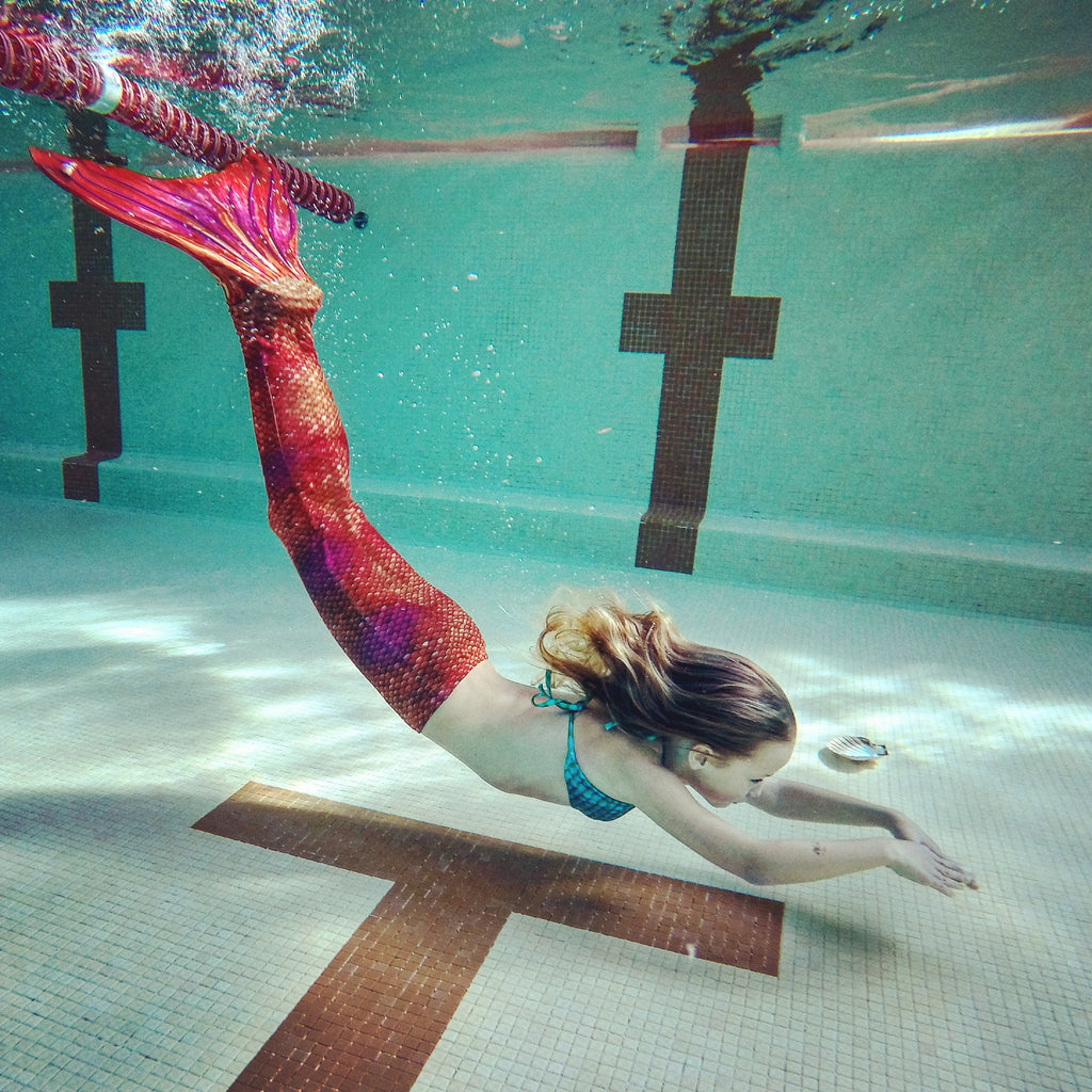 Is it Easier to Swim with a Mermaid Tail?